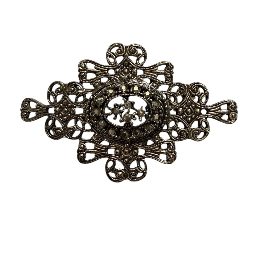 Intricate Silver Brooch
